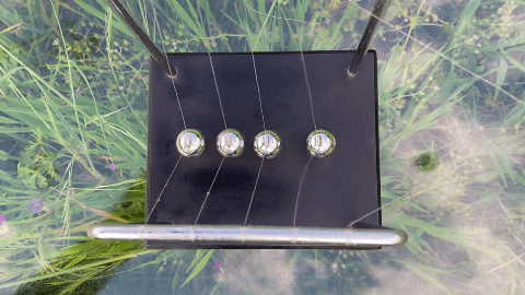 Elevated view of newtons cradle